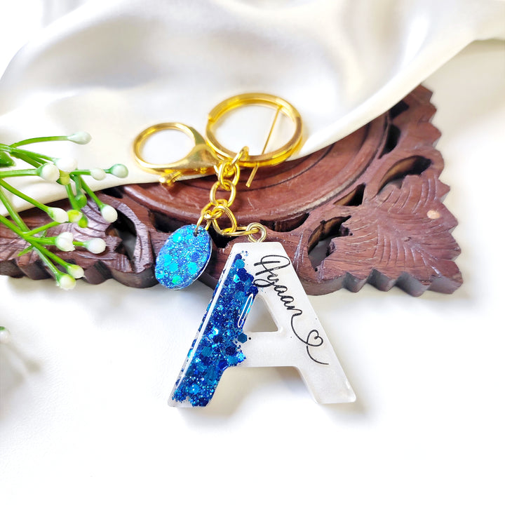 Buy / sell resin personalised alphabate resin keychains online in India. And get delivered pan India near me. Order all resin and acrylic handmade art pieces from https://www.thewalloffaith.com/ the official website of wall of faith. Best gift for him, for her, for couple, for Valentine's day. Best key chain to preserve memory for long term. Can be customised with message.. Couple name.. Your name. Children name. Best gift for everyone. 