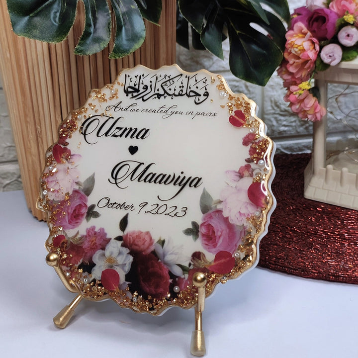 Buy / Order Irregular circle shaped floral pattern resin nikah frame online in India. And get delivered pan India near me. Order all resin and acrylic handmade art pieces from https://www.thewalloffaith.com/ the official website of wall of faith. You can gift this unique frame to couple as a wedding gift, marriage gift, engagement gift, nikkah favour, room decor, table decor. best save the date frame