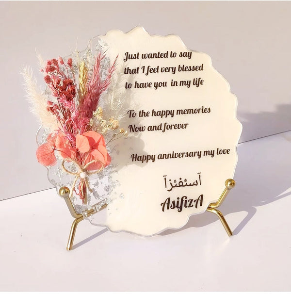 Buy / Order customised Anniversary message mini frame with real dried flower bouquet online in India. And get delivered pan India near me. Order from https://www.thewalloffaith.com/ the official website of wall of faith. It can be used as nikkah favours, marriage favours, corporate gift, resin message frame, marriage gift, nikkah gift, anniversary gift, couple gift, engagement gift. You can preserve your special flowers too in this frame.
