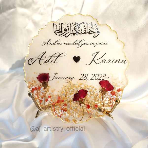 Buy / Order Irregular circle shaped resin anniversary frame with real dried rose buds online in India. And get delivered pan India near me. Order all resin and acrylic handmade art pieces from https://www.thewalloffaith.com/ the official website of wall of faith. You can gift this unique frame to couple as a wedding gift, marriage gift, engagement gift, nikkah favour, room decor, table decor. best save the date frame