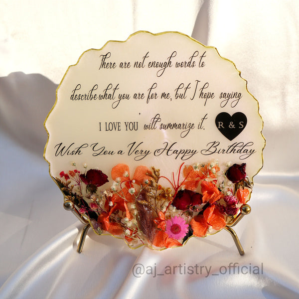 Buy / Order Irregular shaped resin birthday frame with real dried flower bouquet online in India. And get delivered pan India near me. Order all resin and acrylic handmade art pieces from https://www.thewalloffaith.com/ the official website of wall of faith. You can gift this unique frame to couple as a wedding gift, marriage gift, engagement gift, nikkah favour, room decor, table decor. best save the date frame.
