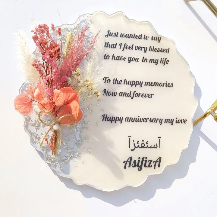Buy / Order customised Anniversary message mini frame with real dried flower bouquet online in India. And get delivered pan India near me. Order from https://www.thewalloffaith.com/ the official website of wall of faith. It can be used as nikkah favours, marriage favours, corporate gift, resin message frame, marriage gift, nikkah gift, anniversary gift, couple gift, engagement gift., engagement gift.